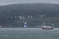 Kite boarders, sailboat and bay cruise